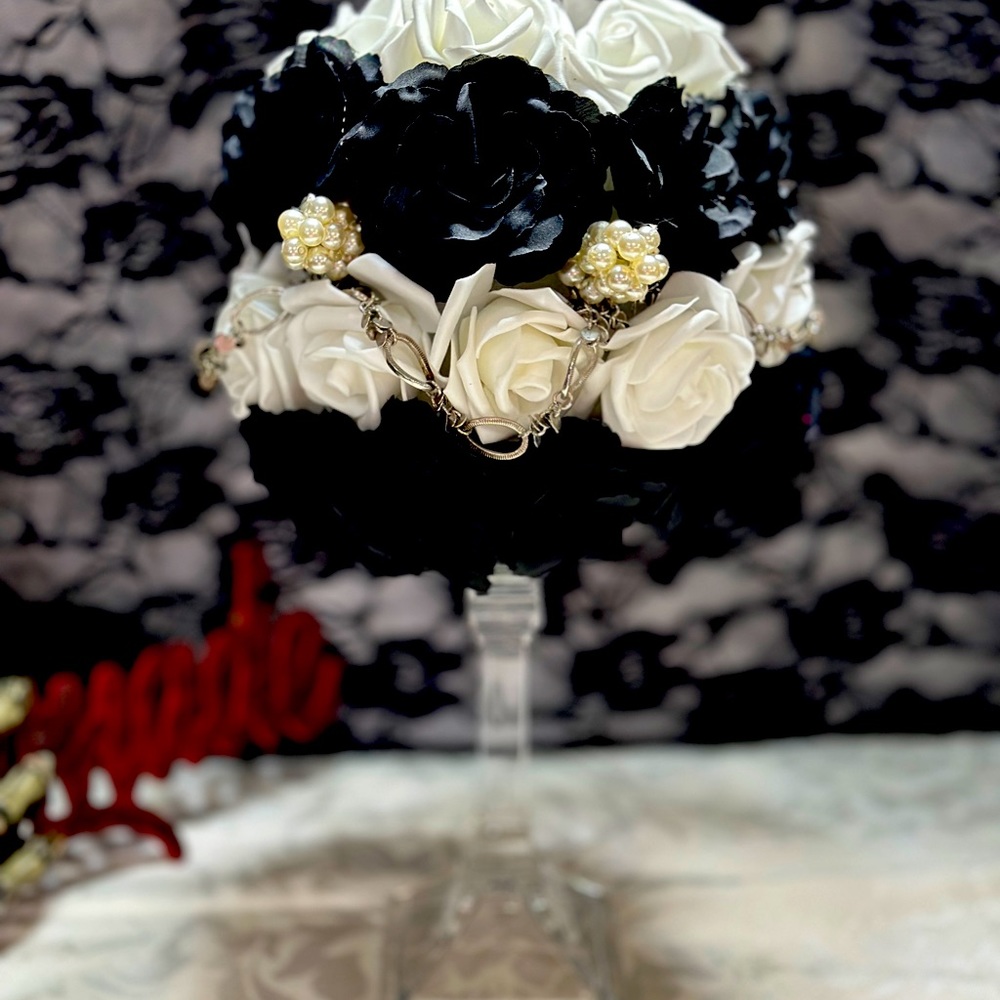 Gothic and vintage comes together in beautiful pompadour wedding centerpiece.